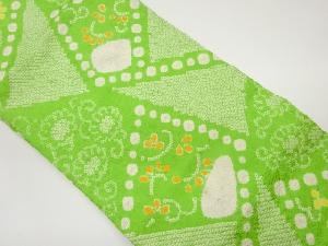 絞り切り嵌め風花唐草に抽象模様名古屋帯